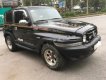 Ssangyong Korando 2004 - Bán xe Ssangyong Korando TX5 AT 4WD năm 2004, màu đen, xe nhập