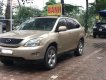 Lexus RX 2005 - Bán ô tô Lexus RX 330 2005, màu vàng, nhập khẩu