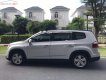 Chevrolet Orlando LT 1.8 MT 2012 - Cần bán gấp Chevrolet Orlando LT 1.8 MT sản xuất năm 2012, màu bạc