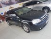 Daewoo Lacetti 2011 - Cần bán gấp Daewoo Lacetti sản xuất 2011, màu đen, 185tr