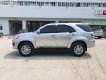 Toyota Fortuner 2013 - Cần bán Toyota Fortuner năm 2013, màu bạc xe còn mới