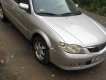 Mazda 323 2003 - Cần bán Mazda 323 MT sản xuất 2003, màu bạc chính chủ