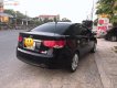 Kia Forte SX 1.6 MT 2011 - Bán xe Kia Forte SX 1.6 MT năm sản xuất 2011, màu đen xe gia đình