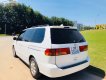Honda Odyssey 2004 - Cần bán xe Honda Odyssey 2004, màu trắng, nhập khẩu nguyên chiếc chính hãng