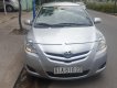 Toyota Vios 2010 - Cần bán lại xe Toyota Vios E 2010, màu bạc