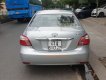 Toyota Vios 2010 - Cần bán lại xe Toyota Vios E 2010, màu bạc