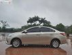 Toyota Vios 2015 - Cần bán gấp Toyota Vios 1.5E sản xuất 2015, màu vàng xe còn mới lắm