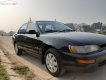 Toyota Corolla 1996 - Cần bán gấp Toyota Corolla sản xuất năm 1996, màu đen, nhập khẩu chính hãng