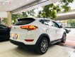 Hyundai Tucson 2016 - Cần bán gấp Hyundai Tucson sản xuất năm 2016, màu trắng, nhập khẩu nguyên chiếc chính hãng