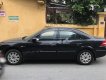 Ford Mondeo  AT 2004 - Cần bán xe cũ Ford Mondeo AT 2004, màu đen