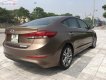 Hyundai Lantra 2.0AT 2016 - Cần bán gấp Hyundai Lantra 2.0AT sản xuất 2016, màu nâu chính chủ, giá 585tr