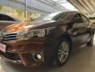 Toyota Corolla   2016 - Cần bán Toyota Corolla sản xuất 2016, màu nâu như mới