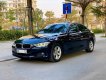 BMW 3 Series 320i 2014 - Bán xe BMW 3 Series 320i sản xuất năm 2014, màu đen, xe nhập, 850 triệu