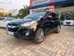 Hyundai Tucson   2011 - Bán Hyundai Tucson 2.0 AT 4WD năm sản xuất 2011, màu đen, nhập khẩu 