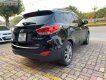 Hyundai Tucson   2011 - Bán Hyundai Tucson 2.0 AT 4WD năm sản xuất 2011, màu đen, nhập khẩu 