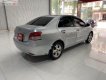 Toyota Vios E 2010 - Cần bán gấp Toyota Vios E năm 2010, màu bạc số sàn