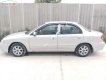 Kia Spectra 1.6 MT 2005 - Bán Kia Spectra 1.6 MT sản xuất 2005, màu bạc, xe nhập, giá 100tr