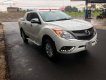 Mazda BT 50 2.2L 4X2 AT 2015 - Cần bán gấp Mazda BT 50 2.2L 4X2 AT đời 2015, màu trắng, nhập khẩu số tự động giá cạnh tranh