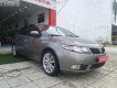 Kia Forte 2011 - Bán xe Kia Forte MT năm 2011, màu xám còn mới