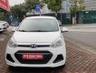 Hyundai Grand i10 1.0 MT 2014 - Bán xe Hyundai i10 1.0 MT đời 2014, màu trắng, nhập khẩu chính hãng