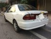 Mazda 323 2001 - Bán xe Mazda 323 năm sản xuất 2000, màu trắng, 71tr