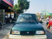 Suzuki Vitara JLX 2004 - Cần bán Suzuki Vitara JLX 2004, màu xanh lam số sàn giá cạnh tranh