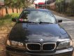 BMW 3 Series 2004 - Cần bán lại xe BMW 3 Series 318i AT 2004, màu đen xe gia đình, 250 triệu