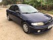 Mazda 323 2000 - Cần bán lại xe Mazda 323 đời 2000, màu xanh lam