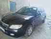 Mazda 323 2003 - Cần bán Mazda 323 sản xuất 2003, 136 triệu