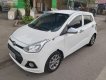 Hyundai Grand i10 2014 - Cần bán xe Hyundai Grand i10 1.0 MT đời 2014, màu trắng, nhập khẩu nguyên chiếc số sàn