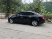 Chevrolet Cruze LS 2015 - Bán ô tô Chevrolet Cruze LS sản xuất 2015, màu đen số sàn, 310tr