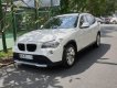 BMW X1 sDrive18i 2011 - Cần bán BMW X1 sDrive18i sản xuất năm 2011, màu trắng, nhập khẩu nguyên chiếc còn mới