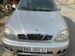 Daewoo Lanos SX 2002 - Cần bán gấp Daewoo Lanos SX đời 2002, màu bạc