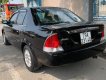 Ford Laser Delu 2001 - Cần bán Ford Laser Delu 2001, màu đen