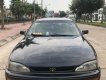 Toyota Camry XLE 3.0 AT 1995 - Bán Toyota Camry XLE 3.0 AT sản xuất năm 1995, màu đen, nhập khẩu xe gia đình