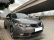 Kia Forte   2010 - Bán xe cũ Kia Forte SX 1.6 AT năm sản xuất 2010, màu xám