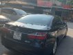 Toyota Camry 2.0E 2015 - Cần bán xe Toyota Camry 2.0E đời 2015, màu đen xe gia đình