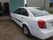 Daewoo Lacetti EX 1.6 MT 2005 - Cần bán lại xe Daewoo Lacetti EX 1.6 MT sản xuất năm 2005, màu trắng xe gia đình, 118tr