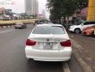 BMW 3 Series   2011 - Cần bán BMW 320i 2011, màu trắng, nhập khẩu nguyên chiếc