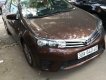 Toyota Corolla altis 2015 - Cần bán xe Toyota Corolla Altis 1.8G MT đời 2015, màu nâu, giá tốt