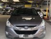 Hyundai Tucson 2011 - Cần bán xe Hyundai Tucson sản xuất năm 2011, màu xám, nhập khẩu, giá tốt