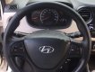 Hyundai Grand i10 2015 - Cần bán gấp Hyundai Grand i10 đời 2015, màu trắng, nhập khẩu