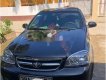 Daewoo Lacetti 2011 - Cần bán gấp Daewoo Lacetti EX sản xuất năm 2011, màu đen chính chủ giá cạnh tranh