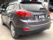 Hyundai Tucson 2011 - Cần bán xe Hyundai Tucson sản xuất năm 2011, màu xám, nhập khẩu, giá tốt