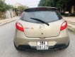 Mazda 2 2014 - Bán xe Mazda 2 đời 2014, màu vàng