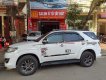 Toyota Fortuner 2014 - Cần bán Toyota Fortuner đời 2014, màu trắng số tự động, giá 670tr