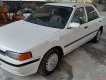 Mazda 323 1998 - Cần bán xe Mazda 323 sản xuất năm 1998, màu trắng, nhập khẩu, 45tr