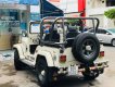 Jeep CJ 5 2.5 MT   1990 - Cần bán gấp Jeep CJ 5 2.5 MT đời 1990, màu trắng, nhập khẩu nguyên chiếc