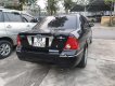 Ford Laser 1.8 AT ghia 2005 - Bán Ford Laser 1.8 AT ghia đời 2005, màu đen số tự động, giá chỉ 199 triệu