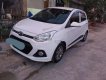 Hyundai Grand i10 2015 - Cần bán gấp Hyundai Grand i10 đời 2015, màu trắng, nhập khẩu nguyên chiếc giá cạnh tranh